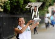 6 June 2011; Donegal's Catriona Jennings lifts the trophy after winning the 2011 Flora Womens Mini Marathon. 2011 Flora Womens Mini Marathon, Dublin City. Picture credit: Pat Murphy / SPORTSFILE