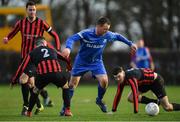 14 January 2017; Peter Ryan of Ballynanty Rovers in action against Rory Byrne, left, Mark McGrath and Aaron Kelly, right, of Rush Athletic. FAI Junior Cup in association with Aviva and Umbro – Round 6 Match, Rush Athletic v Ballynanty Rovers, St Catherine’s Park, Rush, Dublin. Televised for Eir Sport and Irish TV. The FAI Junior Cup Final will take place at Aviva Stadium on the 13th May 2016 - #RoadToAviva.  Photo by Brendan Moran/Sportsfile