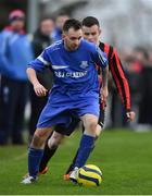 14 January 2017; Derek Daly of Ballynanty Rovers in action against Brian Gillon of Rush Athletic. FAI Junior Cup in association with Aviva and Umbro – Round 6 Match, Rush Athletic v Ballynanty Rovers, St Catherine’s Park, Rush, Dublin. Televised for Eir Sport and Irish TV. The FAI Junior Cup Final will take place at Aviva Stadium on the 13th May 2016 - #RoadToAviva.  Photo by Brendan Moran/Sportsfile