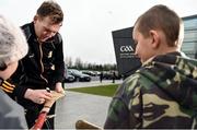 15 January 2017; Walter Walsh of Kilkenny signs autographs for young supporters ahead of the Bord na Mona Walsh Cup Group 2 Round 2 match between Kilkenny and Antrim at Abbotstown GAA Ground in Abbotstown, Co Dublin. Photo by Cody Glenn/Sportsfile