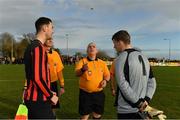 14 January 2017; Referee Declan Troy performs the coin toss in the company of team captains Stephen McNamara, right, of Ballynanty Rovers and Rory Byrne of Rush Athletic before the game. FAI Junior Cup in association with Aviva and Umbro – Round 6 Match, Rush Athletic v Ballynanty Rovers, St Catherine’s Park, Rush, Dublin. Televised for Eir Sport and Irish TV. The FAI Junior Cup Final will take place at Aviva Stadium on the 13th May 2016 - #RoadToAviva.  Photo by Brendan Moran/Sportsfile