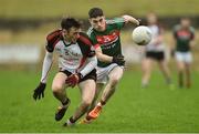 15 January 2017; James Durcan of Mayo in action against Rob Gorman of Sligo IT during the Connacht FBD League Section A Round 2 match between Mayo and Sligo IT at James Stephen's Park in Ballina, Co Mayo. Photo by David Maher/Sportsfile