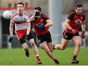 15 January 2017; Oisin Duffin of Derry in action against Ryan McAleenan of Down during the Bank of Ireland Dr. McKenna Cup Section A Round 2 match between Down and Derry at Pairc Esler in Newry. Photo by Philip Fitzpatrick/Sportsfile