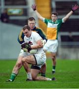 15 January 2017; Tommy Moolick of Kildare in action against Offaly goalkeeper Alan Mulhall during the Bord na Mona O'Byrne Cup Group 2 Round 3 match between Offaly and Kildare at O'Connor Park in Tullamore, Co Offaly. Photo by Piaras Ó Mídheach/Sportsfile