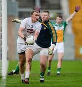 15 January 2017; Tommy Moolick of Kildare in action against Offaly goalkeeper Alan Mulhall during the Bord na Mona O'Byrne Cup Group 2 Round 3 match between Offaly and Kildare at O'Connor Park in Tullamore, Co Offaly. Photo by Piaras Ó Mídheach/Sportsfile