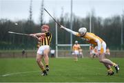 15 January 2017; Richie Hogan of Kilkenny scores a point despite the efforts of Joe Maskey of Antrim during the Bord na Mona Walsh Cup Group 2 Round 2 match between Kilkenny and Antrim at Abbotstown GAA Ground in Abbotstown, Co Dublin. Photo by Cody Glenn/Sportsfile