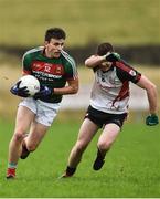 15 January 2017; Jason Doherty of Mayo in action against Eamonn McGrath of Sligo IT during the Connacht FBD League Section A Round 2 match between Mayo and Sligo IT at James Stephen's Park in Ballina, Co Mayo. Photo by David Maher/Sportsfile