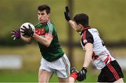 15 January 2017; Alan Freeman of Mayo in action against  Philip Nielan of Sligo IT during the Connacht FBD League Section A Round 2 match between Mayo and Sligo IT at James Stephen's Park in Ballina, Co Mayo. Photo by David Maher/Sportsfile