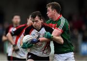 15 January 2017; Eamonn McGrath of Sligo IT in action against Danny Kirby of Mayo during the Connacht FBD League Section A Round 2 match between Mayo and Sligo IT at James Stephen's Park in Ballina, Co Mayo. Photo by David Maher/Sportsfile