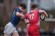 17 January 2017; Luke Fitzgerald of Glenstal Abbey hands off John Bateman of St. Clement's College during the Clayton Hotels Munster Schools Senior Cup 1st Round match between Glenstal Abbey and St. Clement's College at the University of Limerick in Limerick. Photo by Diarmuid Greene/Sportsfile
