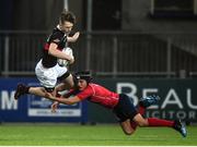 17 January 2017; Jamie O'Connor of The High School is tackled by Ahmed Al Sahaf of CUS during the Bank of Ireland Fr Godfrey Cup Round 2 match between CUS and The High School at Donnybrook Stadium in Donnybrook, Dublin. Photo by Cody Glenn/Sportsfile