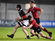 17 January 2017; Adam Killeen of The High School is tackled by Adam Redmond of CUS during the Bank of Ireland Fr Godfrey Cup Round 2 match between CUS and The High School at Donnybrook Stadium in Donnybrook, Dublin. Photo by Cody Glenn/Sportsfile