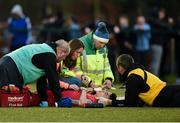17 January 2017; Thanade McCoole of Glenstal Abbey receives medical attention before being stretchered off during the Clayton Hotels Munster Schools Senior Cup 1st Round match between Glenstal Abbey and St. Clement's College at the University of Limerick in Limerick. Photo by Diarmuid Greene/Sportsfile
