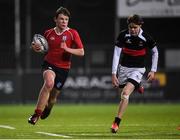 17 January 2017; Benjamin White of CUS sprints past Lorcan Womey of The High School on his way to scoring his side's second try during the Bank of Ireland Fr Godfrey Cup Round 2 match between CUS and The High School at Donnybrook Stadium in Donnybrook, Dublin. Photo by Cody Glenn/Sportsfile