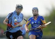 11 June 2011; Tara Corrigan, Dublin, in action against Eimer Shannon, Tipperary. All-Ireland Senior Camogie Championship, Round One, Dublin v Tipperary, Naomh Mhearnog, Portmarnock, Dublin. Picture credit: Stephen McCarthy / SPORTSFILE