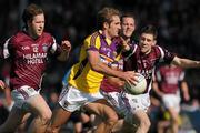 11 June 2011; Brian Malone, Wexford, in action against Conor Lynam, left, and James Dolan, Westmeath. Leinster GAA Football Senior Championship Quarter-Final, Wexford v Westmeath, Wexford Park, Wexford. Picture credit: Pat Murphy / SPORTSFILE