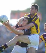 11 June 2011; Darragh Daly, Westmeath, in action against Daithi Waters, Wexford. Leinster GAA Football Senior Championship Quarter-Final, Wexford v Westmeath, Wexford Park, Wexford. Picture credit: Matt Browne / SPORTSFILE