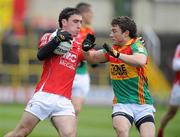 12 June 2011; Derek Maguire, Louth, in action against Kieran Nolan, Carlow. Leinster GAA Football Senior Championship Quarter-Final, Carlow v Louth, O'Moore Park, Portlaoise, Co. Laois. Picture credit: Matt Browne / SPORTSFILE