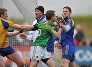 12 June 2011; James Glancy, Leitrim, involved in an altercation with Roscommon players Peter Domican, left, and goalkeeper Geoffrey Claffey. Connacht GAA Football Senior Championship Semi-Final, Leitrim v Roscommon, Páirc Seán Mac Diarmada, Carrick-on-Shannon, Co. Leitrim. Picture credit: David Maher / SPORTSFILE