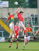 12 June 2011; Brendan Murphy, Carlow, in action against Brian Donnelly, Louth. Leinster GAA Football Senior Championship Quarter-Final, Carlow v Louth, O'Moore Park, Portlaoise, Co. Laois. Picture credit: Matt Browne / SPORTSFILE
