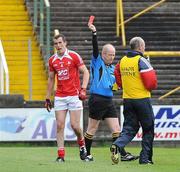 12 June 2011; Dessie Finnegan, Louth, is sent off by referee Derek Fahy. Leinster GAA Football Senior Championship Quarter-Final, Carlow v Louth, O'Moore Park, Portlaoise, Co. Laois. Picture credit: Matt Browne / SPORTSFILE