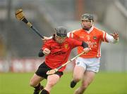 12 June 2011; Eoin Clarke, Down, in action against John Corvan, Armagh. Ulster GAA Hurling Senior Championship Semi-Final, Armagh v Down, Casement Park, Belfast, Co. Antrim. Picture credit: Oliver McVeigh / SPORTSFILE