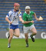 12 June 2011; John Mullane, Waterford, in action against Tom Condon, Limerick. Munster GAA Hurling Senior Championship Semi-Final, Limerick v Waterford, Semple Stadium, Thurles, Co. Tipperary. Picture credit: Stephen McCarthy / SPORTSFILE
