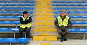 12 June 2011; Match stewards Larry Kavanagh, left, from Thurles, Co. Tipperary, and Tom Ryan, from Caherconlish, Co. Limerick, await for spectators before the game. Munster GAA Hurling Senior Championship Semi-Final, Limerick v Waterford, Semple Stadium, Thurles. Picture credit: Dáire Brennan / SPORTSFILE