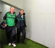 12 June 2011; Limerick manager Donal O'Grady, right, makes his way to the pitch with team liason officer Joe Hannon. Munster GAA Hurling Senior Championship Semi-Final, Limerick v Waterford, Semple Stadium, Thurles, Co. Tipperary. Picture credit: Dáire Brennan / SPORTSFILE