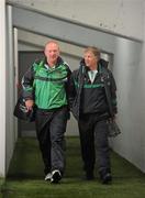 12 June 2011; Limerick manager Donal O'Grady, right, makes his way to the pitch with team liason officer Joe Hannon. Munster GAA Hurling Senior Championship Semi-Final, Limerick v Waterford, Semple Stadium, Thurles, Co. Tipperary. Picture credit: Stephen McCarthy / SPORTSFILE