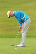 13 June 2011; Alexander Hjalmarsson, Sweden, putts on the 18th green during the 1st Qualifying Round of the 74th World Open One Armed Championships. Co. Meath Golf Club, Newtownmoynagh, Trim, Co. Meath. Picture credit: Stephen McCarthy / SPORTSFILE