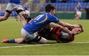 18 January 2017; Mark Braithwaite of Kilkenny College scores a try despite the tackle of Patrick Power of Wilsons College during the Bank of Ireland Vinnie Murray Cup Round 2 match between Kilkenny College and Wilsons Hospital at Donnybrook Stadium in Donnybrook, Dublin. Photo by Cody Glenn/Sportsfile