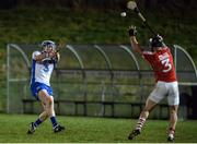 18 January 2017; Stephen Bennett of Waterford scoring a point despite the efforts of Colm Spillane of Cork during the Co-Op Superstores Munster Senior Hurling League Round 3 match between Cork and Waterford at Mallow GAA Grounds in Mallow, Co Cork. Photo by Eóin Noonan/Sportsfile