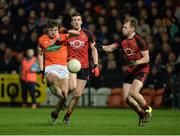 18 January 2017; Niall Grimley of Armagh in action against Gerard McGovern of Down during the Bank of Ireland Dr. McKenna Cup Section A Round 3 match between Armagh and Down at the Athletic Grounds in Armagh. Photo by Oliver McVeigh/Sportsfile