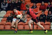 18 January 2017; Jamie Clarke of Armagh in action against Gearard McGovern of Down during the Bank of Ireland Dr. McKenna Cup Section A Round 3 match between Armagh and Down at the Athletic Grounds in Armagh. Photo by Oliver McVeigh/Sportsfile