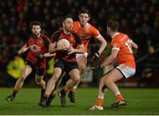 18 January 2017; Ryan Mallon of Down in action against Ben Crealey and Anthony Duffy of Armagh during the Bank of Ireland Dr. McKenna Cup Section A Round 3 match between Armagh and Down at the Athletic Grounds in Armagh. Photo by Oliver McVeigh/Sportsfile