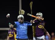 19 January 2017; Fionntan Mac Gib of Dublin in action against Liam Ryan of Wexford during the Bord na Mona Walsh Cup match between Wexford and Dublin at Shelmaliers GAA in Hollymount, Co. Wexford. Photo by Matt Browne/Sportsfile