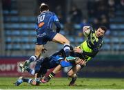 20 January 2017; Robbie Henshaw of Leinster is tackled by Julien Dumora, 10, and Yannick Caballero of Castres during the European Rugby Champions Cup Pool 4 Round 6 match between Castres and Leinster at Stade Pierre Antoine in Castres, France. Photo by Stephen McCarthy/Sportsfile