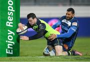20 January 2017; Robbie Henshaw of Leinster goes over to score his side's second try despite the tackle of Steve Mafi of Castres during the European Rugby Champions Cup Pool 4 Round 6 match between Castres and Leinster at Stade Pierre Antoine in Castres, France. Photo by Stephen McCarthy/Sportsfile