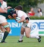14 June 2011; James Tracy, Ireland, attempts to get through the South Africa defense. IRB Junior World Championship, Pool C, Ireland v South Africa, Stadio Communale di Monigo, Treviso, Italy. Picture credit: Roberto Bregani / SPORTSFILE