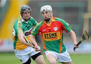 15 June 2011; Alan Corcoran, Carlow, in action against James Mulrooney, Offaly. Walsh Cup Shield Final, Carlow v Offaly, O'Moore Park, Portlaoise, Co. Laois. Picture credit: Matt Browne / SPORTSFILE