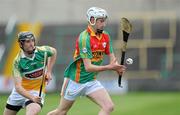 15 June 2011; Alan Corcoran, Carlow, in action against James Mulrooney, Offaly. Walsh Cup Shield Final, Carlow v Offaly, O'Moore Park, Portlaoise, Co. Laois. Picture credit: Matt Browne / SPORTSFILE