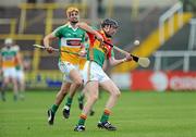 15 June 2011; Dylan Hayden, Carlow, in action against Ruairi Dunbar, Offaly. Walsh Cup Shield Final, Carlow v Offaly, O'Moore Park, Portlaoise, Co. Laois. Picture credit: Matt Browne / SPORTSFILE