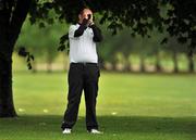 16 June 2011; Robert Paul, England, gauges his line of shot on the 3rd, as he looks through his binoculars during the 74th World Open One Armed Championships final. Co. Meath Golf Club, Newtownmoynagh, Trim, Co. Meath. Picture credit: Barry Cregg / SPORTSFILE