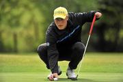 16 June 2011; Alex Hjalmarsson, Sweeden, lines up his putt on the 14th during the 74th World Open One Armed Championships final. Co. Meath Golf Club, Newtownmoynagh, Trim, Co. Meath. Picture credit: Barry Cregg / SPORTSFILE