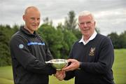 16 June 2011; Alex Hjalmarsson, Sweeden, receives the winning trophy from the captain of Co. Meath Golf Club Gerry O'Reilly after the 74th World Open One Armed Championships final. Co. Meath Golf Club, Newtownmoynagh, Trim, Co. Meath. Picture credit: Barry Cregg / SPORTSFILE