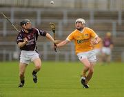 18 June 2011; Karl Stewart, Antrim, in action against Eoin Price, Westmeath. GAA Hurling All-Ireland Senior Championship Preliminary Round, Antrim v Westmeath, Casement Park, Belfast, Co. Antrim. Picture credit: Oliver McVeigh / SPORTSFILE