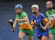 18 June 2011; Fiona Stephens, Offaly, in action against Noreen Flanagan, Tipperary. All-Ireland Senior Camogie Championship, Round 2, in association with RTE Sport, Tipperary v Offaly, Semple Stadium, Thurles, Co. Tipperary. Picture credit: Barry Cregg / SPORTSFILE