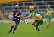 18 June 2011; Jill Horan, Tipperary, in action against Tina Hannon, Offaly. All-Ireland Senior Camogie Championship, Round 2, in association with RTE Sport, Tipperary v Offaly, Semple Stadium, Thurles, Co. Tipperary. Picture credit: Barry Cregg / SPORTSFILE