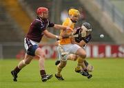 18 June 2011; Simon McCrory, Antrim, in action against Philip Gilsenan and Paul Greville, Westmeath. GAA Hurling All-Ireland Senior Championship Preliminary Round, Antrim v Westmeath, Casement Park, Belfast, Co. Antrim. Picture credit: Oliver McVeigh / SPORTSFILE